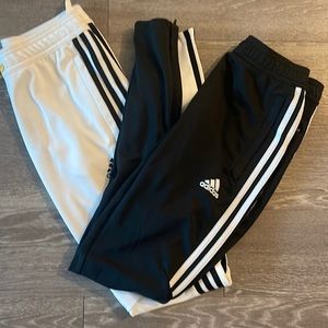 Two adidas track pants
